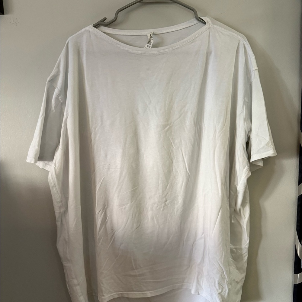 Oversized white Lululemon workout top
